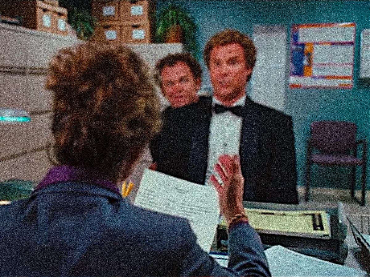 Still from the movie Step Brothers of the two interviewing for a job together.